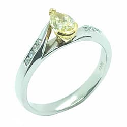 18ct Natural Yellow Pear Shaped Diamond Totaling 0.56ct